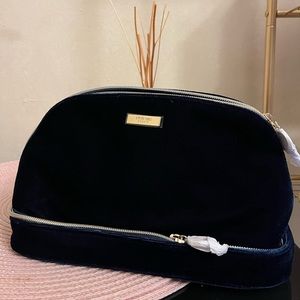 Cle de peau beauty bag in velvet